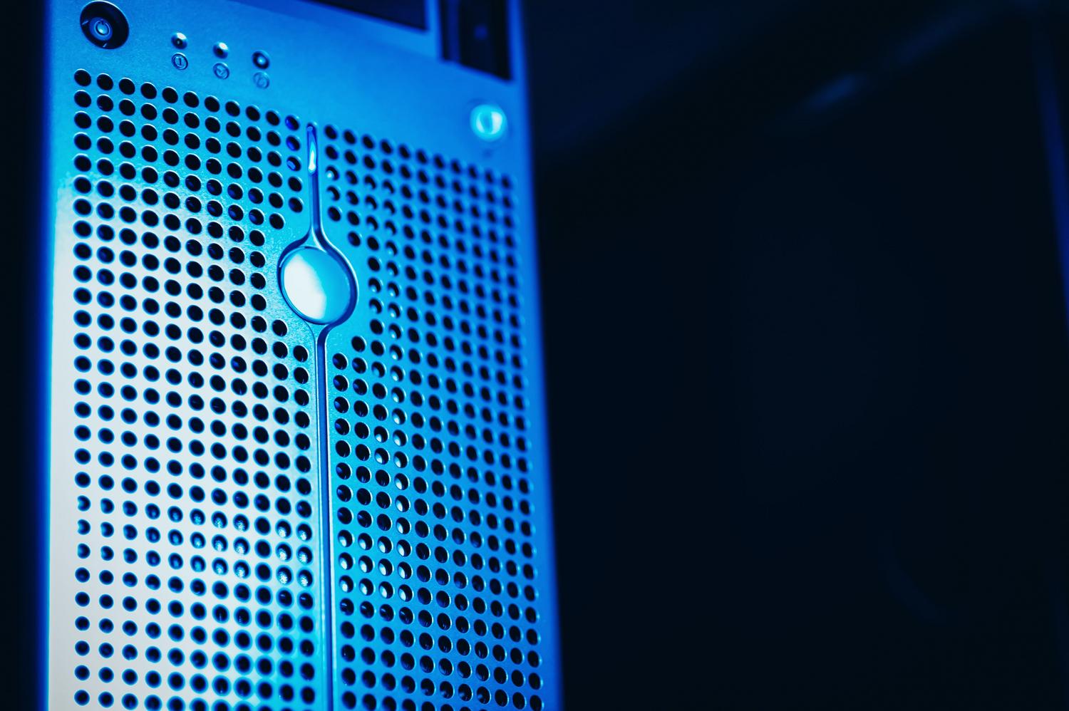 Modern server rack with professional blue lighting, representing the server infrastructure for a remote desktop setup.
